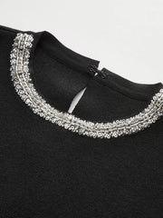 Sleeveless Flared Dress with Sequin Embellishments
